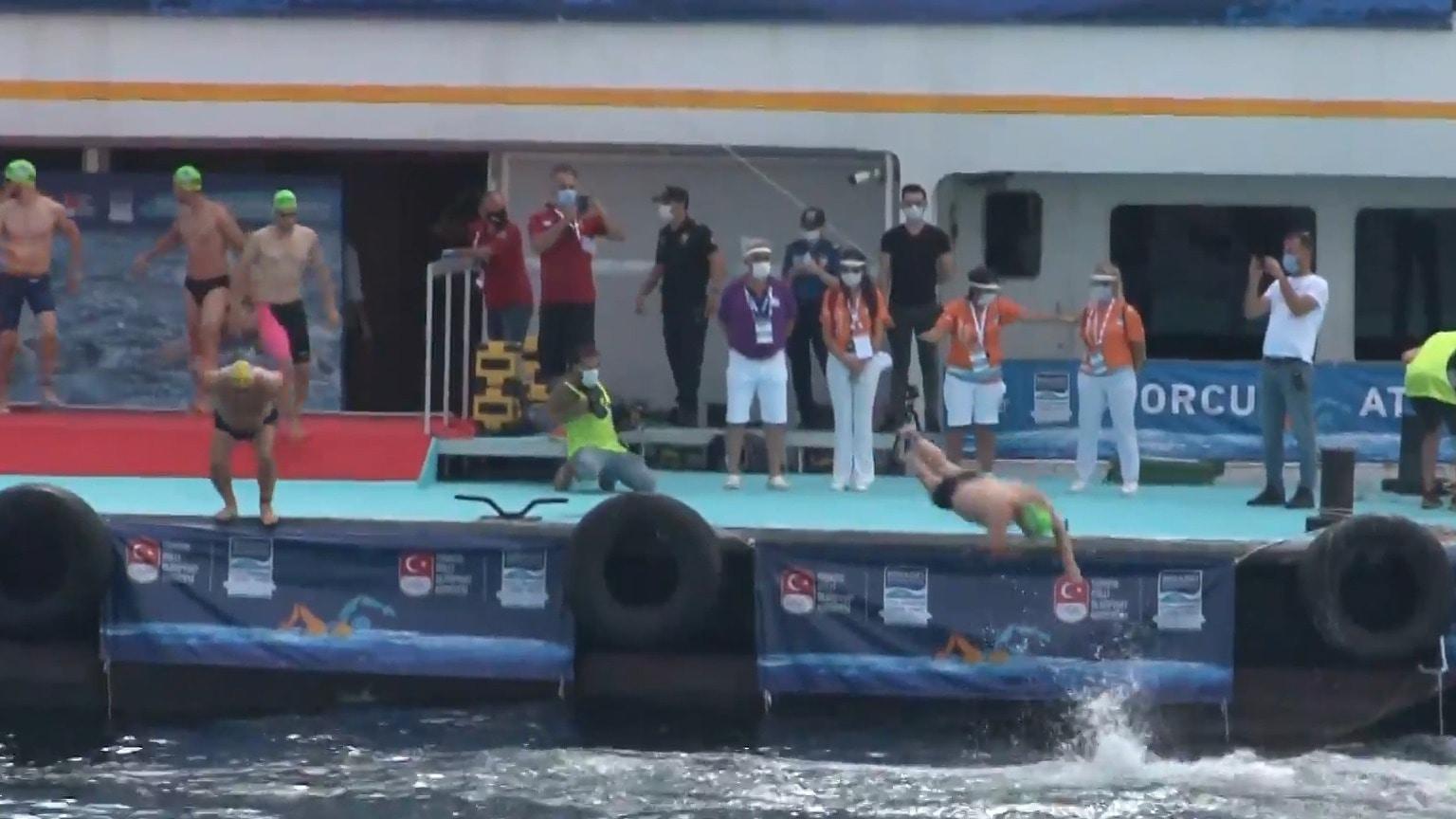Hundreds of athletes swim across the Bosphorus for annual race bridging