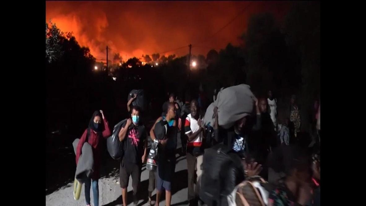 Greece: Crowds of refugees flee as fire consumes Moria camp