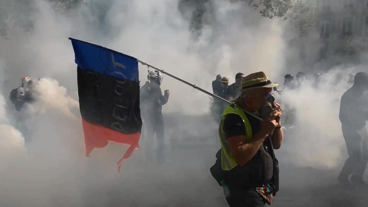 France: Tear gas billows on Paris streets as Yellow Vests protest