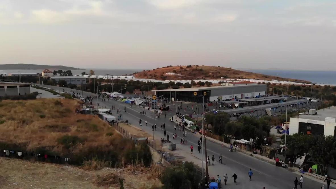 Greece: Migrants continue lodging in makeshift tents in Moria as authorities struggle to relocate them to new camp *DRONE FOOTAGE*