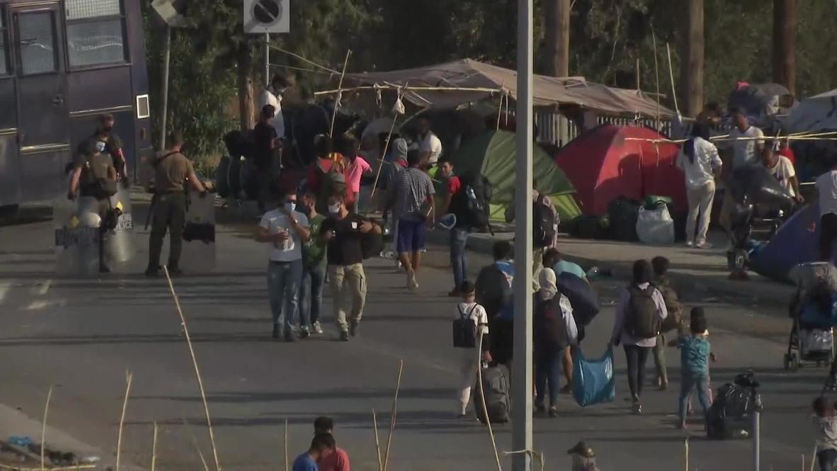 Greece: Police move migrants from streets of Lesbos to a new camp