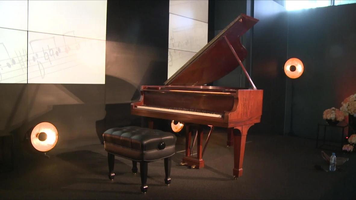 Belongings of Holocaust survivor behind 'The Pianist' movie go for auction in Warsaw