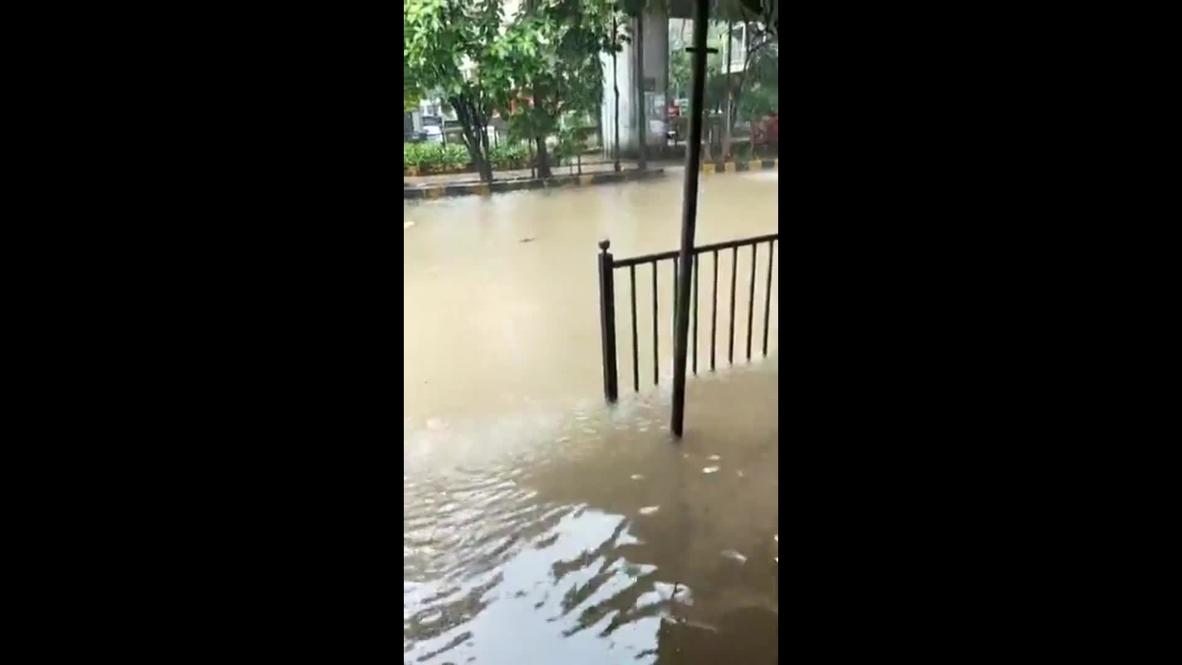 India: Mumbai streets flooded as heavy rains trigger yellow weather alert