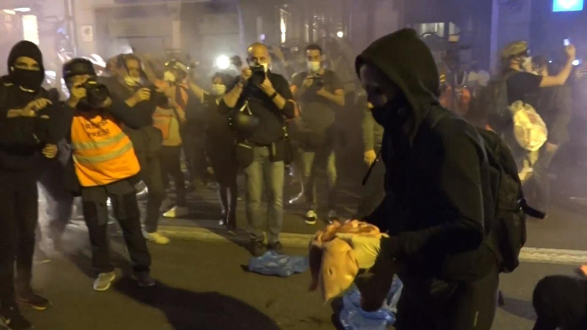 Spain: Pig heads hurled at police during protest over Catalan president's suspension