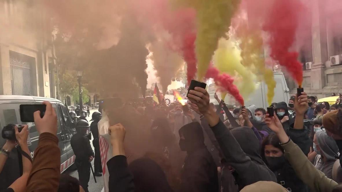 Spain: Protesting students throw paint at govt universities building in colourful strike