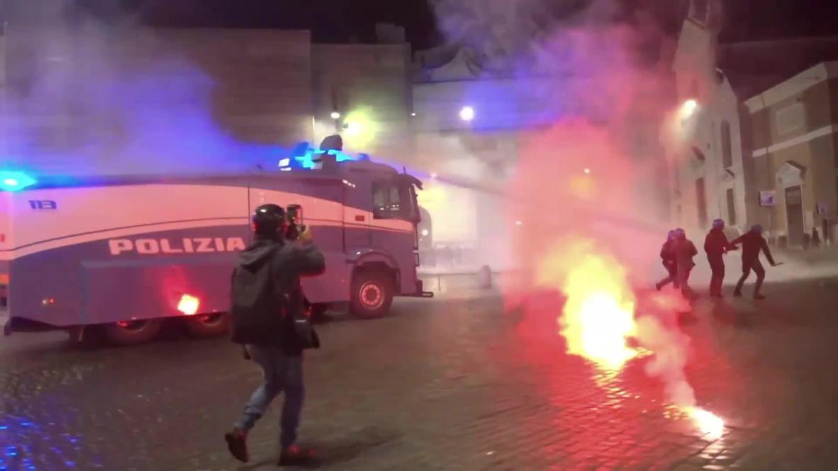 Italy: Police use water cannons and tear gas to disperse Rome rally against COVID restrictions