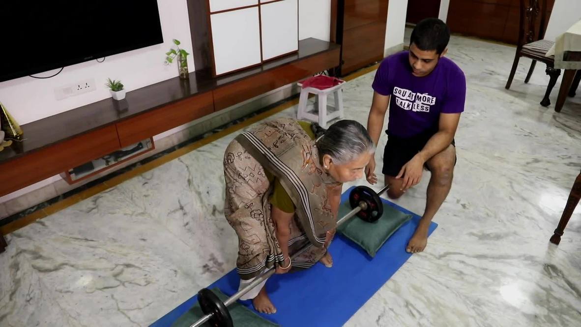 Gutsy granny lifts weights and squats like a pro at 82