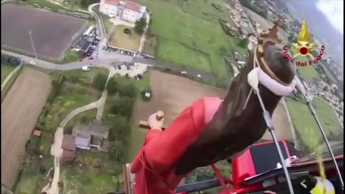 Italy: Saint Barbara statue flies over town in chopper as traditional procession curtailed by COVID