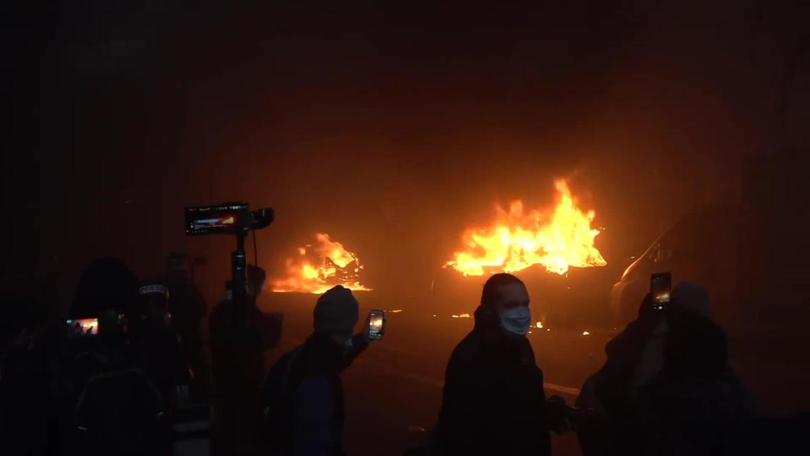 France: Cars set ablaze as protesters rally against security bill in Paris