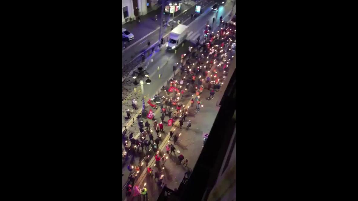 France: Anti-restriction protesters march with lit torches in Marseille despite curfew