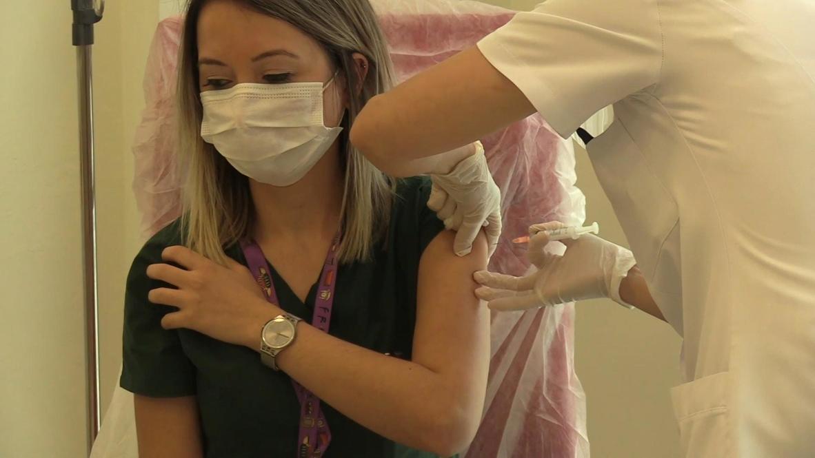 Turkey: Health workers get first COVID jabs as mass vaccination begins in Istanbul