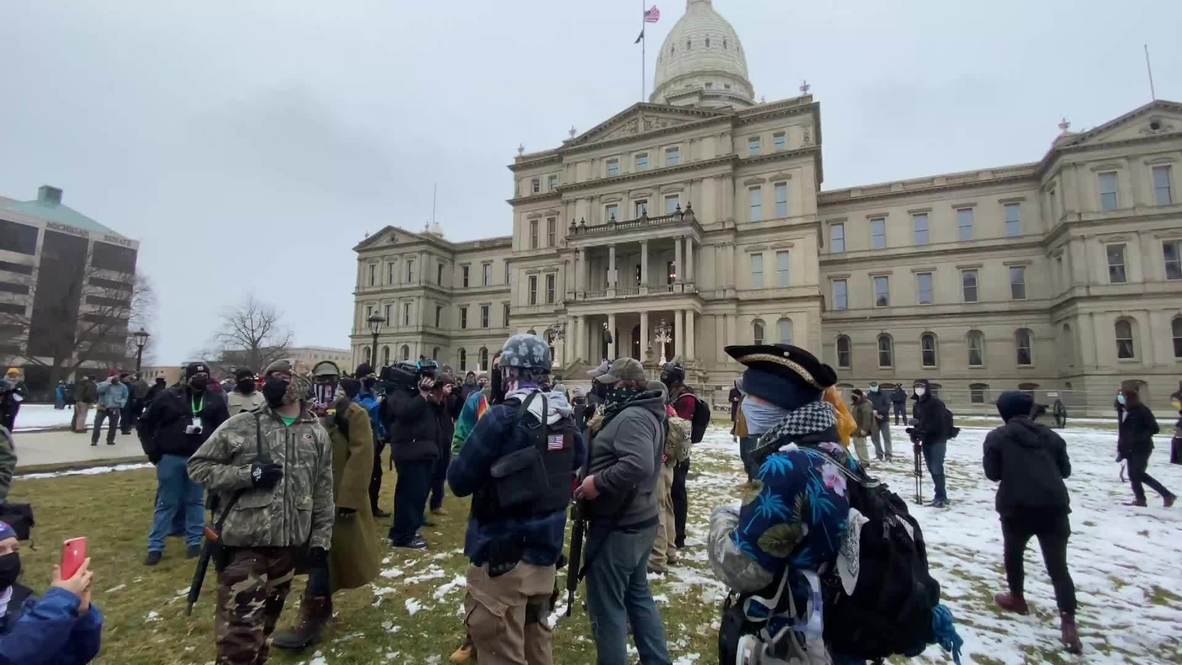 USA: Small group of armed protesters rallies in front of Michigan Capitol