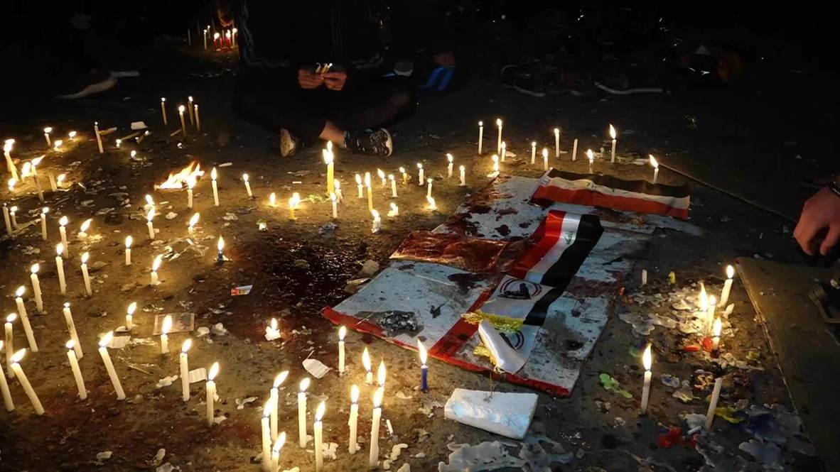 العراق: سكان بغداد يوقدون الشموع حدادا على أرواح ضحايا التفجير الانتحاري المزدوج