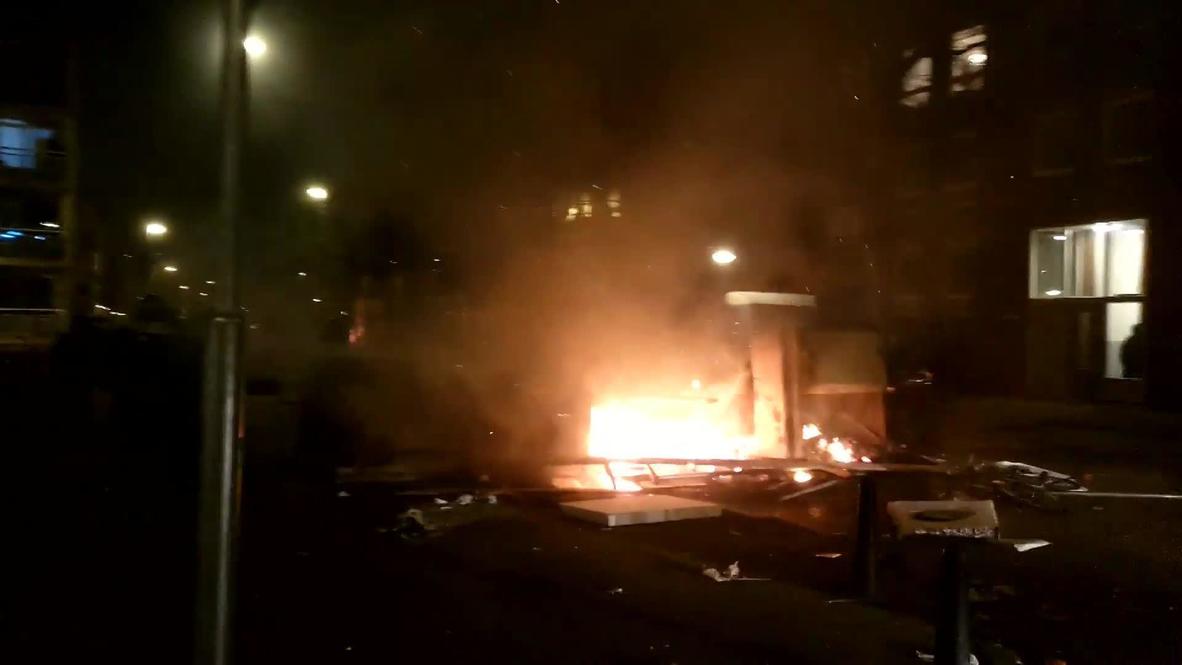 Netherlands: Riot police patrol streets following anti-curfew demo in Rotterdam