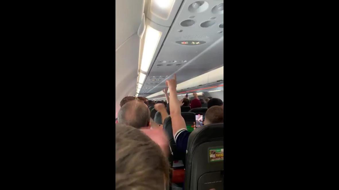 UK Scottish fans sing Yes Sir, I Can Boogie on flight to London for