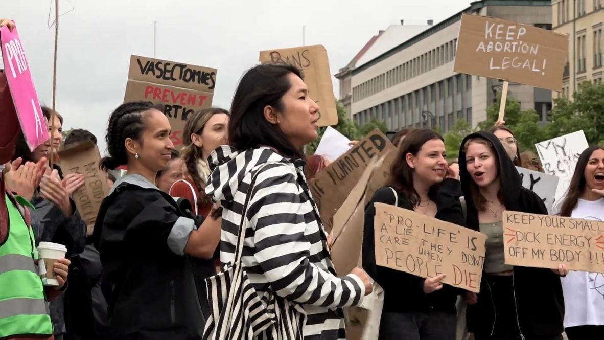 Germany Women's rights activists rally against abortion ban at US