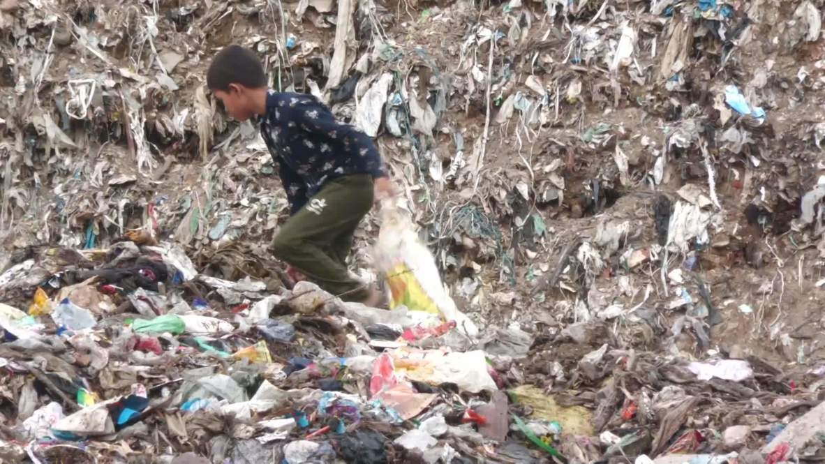 India: Children living and working in New Delhi's trash mountain as country grapples with plastic waste crisis