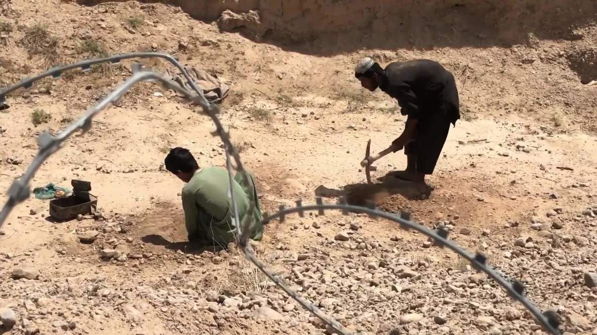 Afghanistan: Helmand's forgotten youths risk their lives to scavenge for abandoned bombs and shell casings
