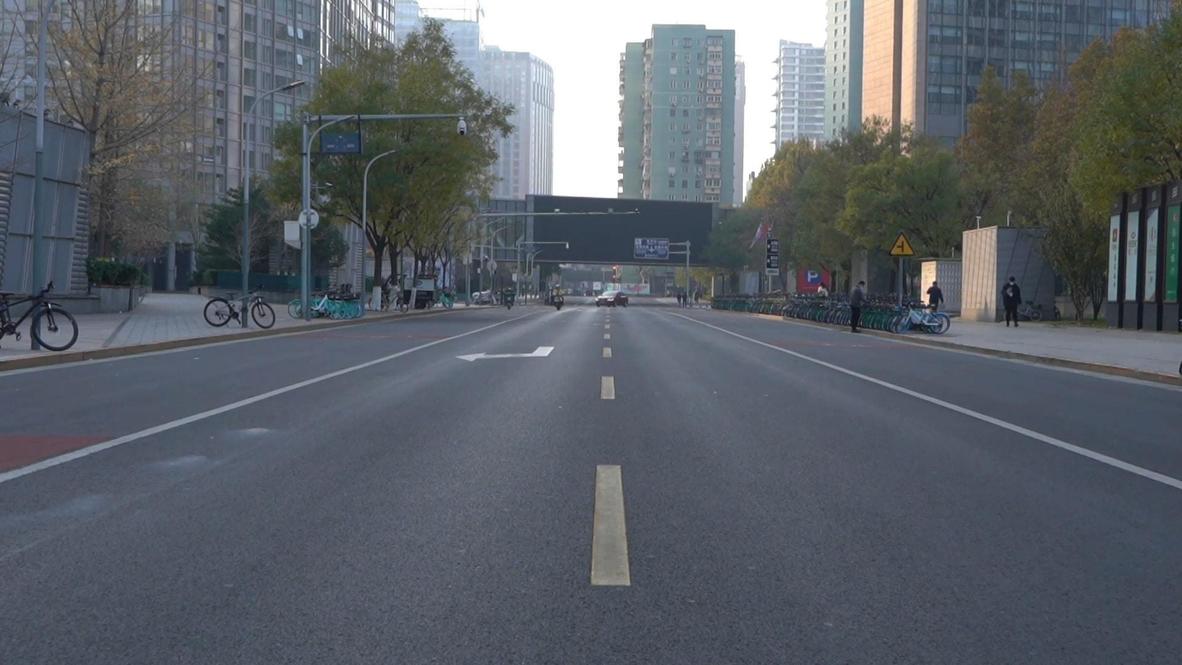 China: Beijing's business district deserted as staff urged to work from home amid COVID surge