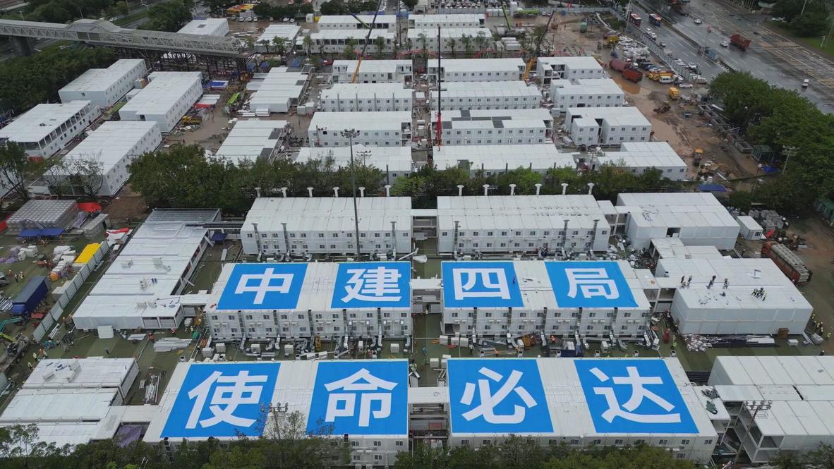 China: Guangzhou locks down most populous district, builds makeshift hospital as COVID cases surge