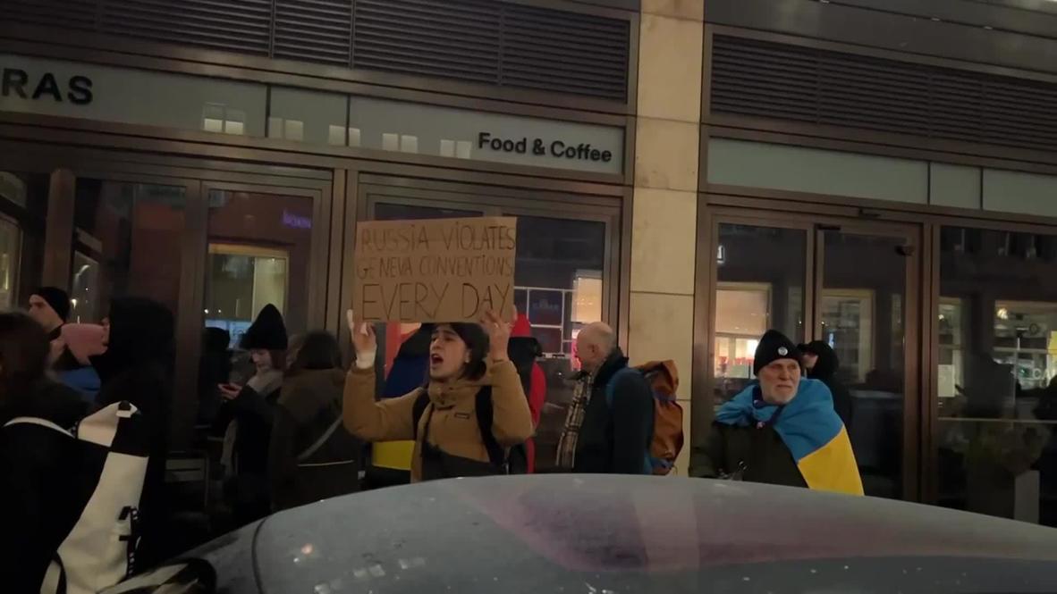 Germany: Pro-Ukraine demonstrators protest by Russian House in Berlin during Christmas event