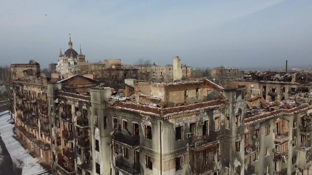 Drone footage captures destroyed residential areas and new buildings construction in Mariupol