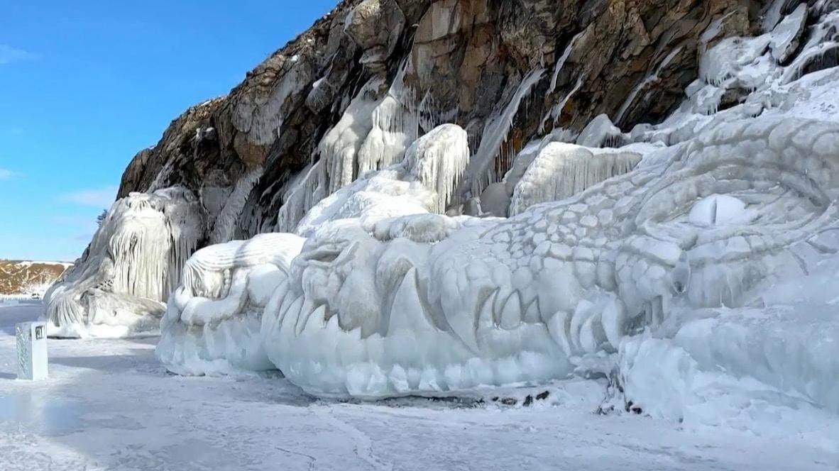 Frozen fairy tales! Huge ice sculptures rise from the waves at Lake