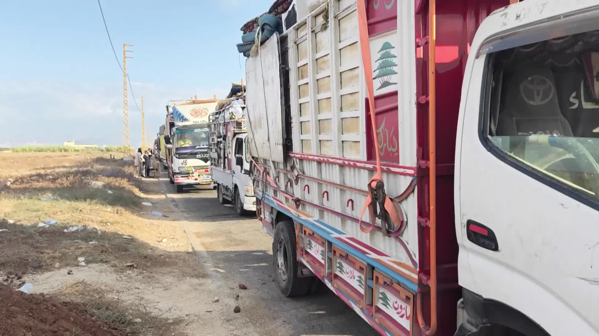 Worth the wait! - Syrian refugees see long queues at Arida border crossing as many return home