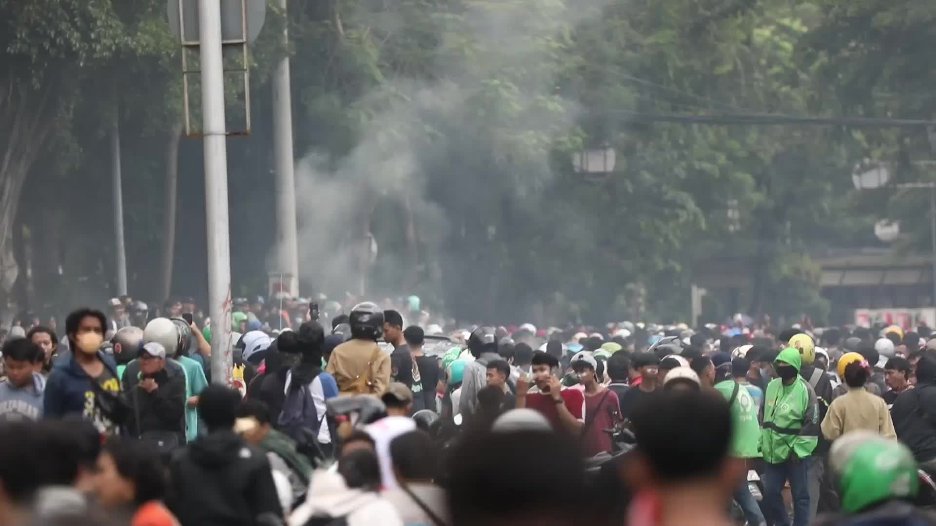 Capital in chaos - Explosives and flames rock Jakarta for second night following deadly crackdown