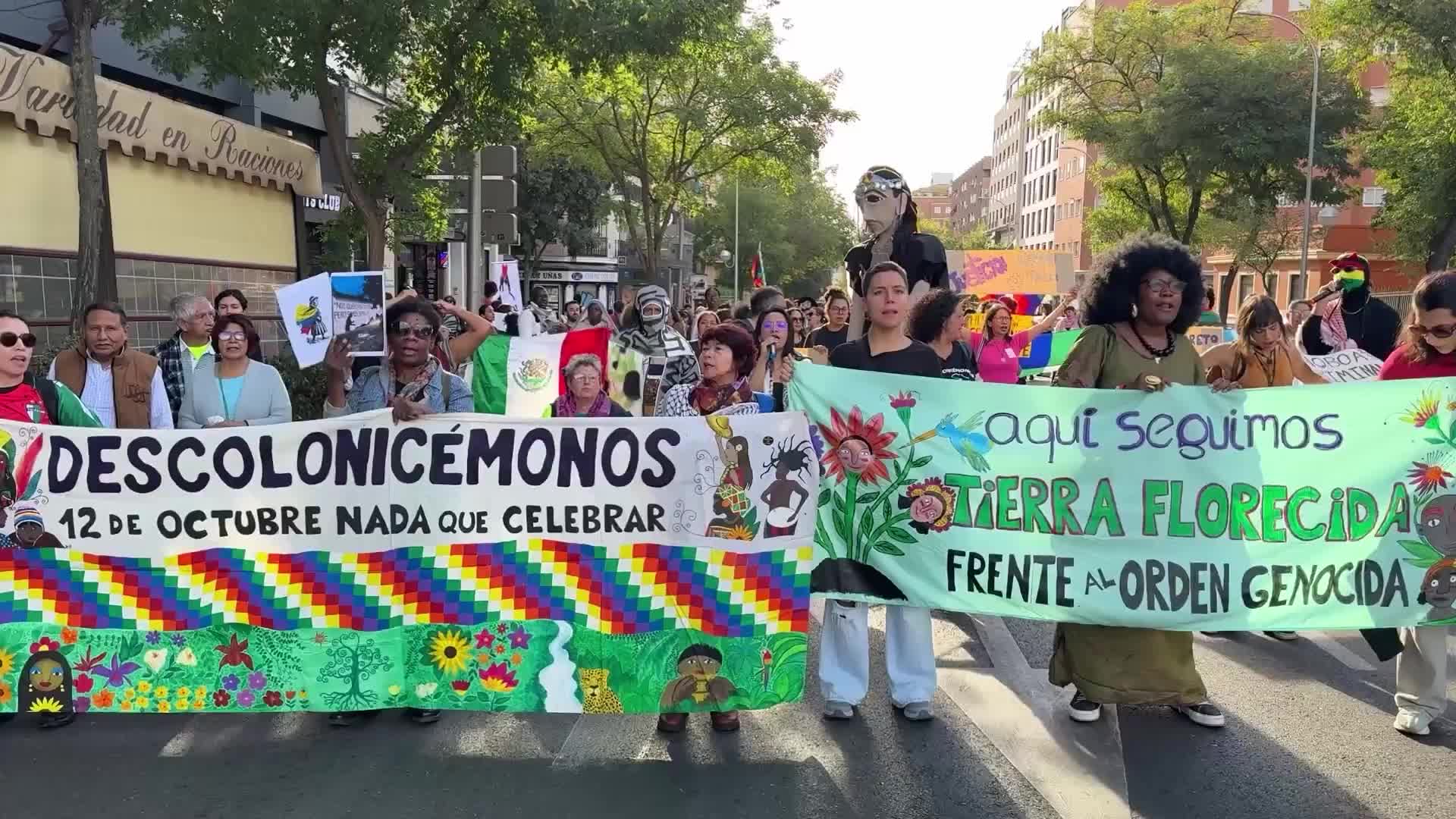 ‘Long live the anti-racist struggle' - Hundreds join Hispanic Day anti-colonialism rally in Madrid