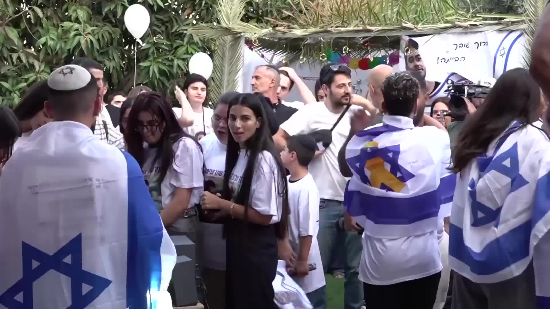 Watching and waiting - Family and friends of Yosef Haim Ohana gather for news ahead of hostages release