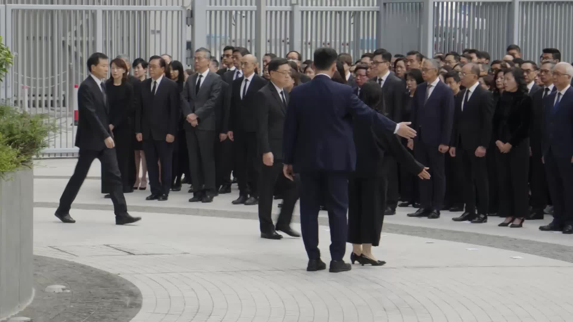 Tears in Hong Kong - Chief Executive, senior officials, residents attend memorial to mourn Wang Fuk fire victims