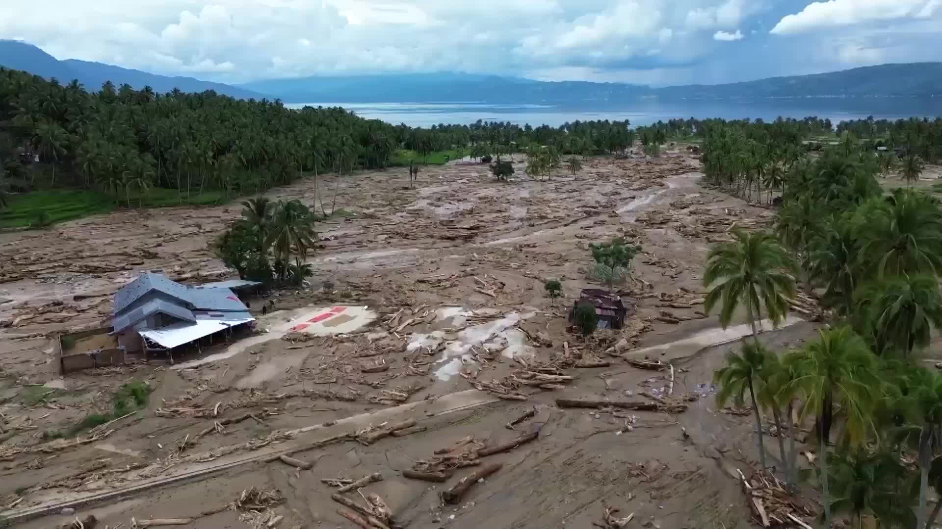 Indonesia floods - Houses destroyed, land inundated as locals deal with aftermath in Solok